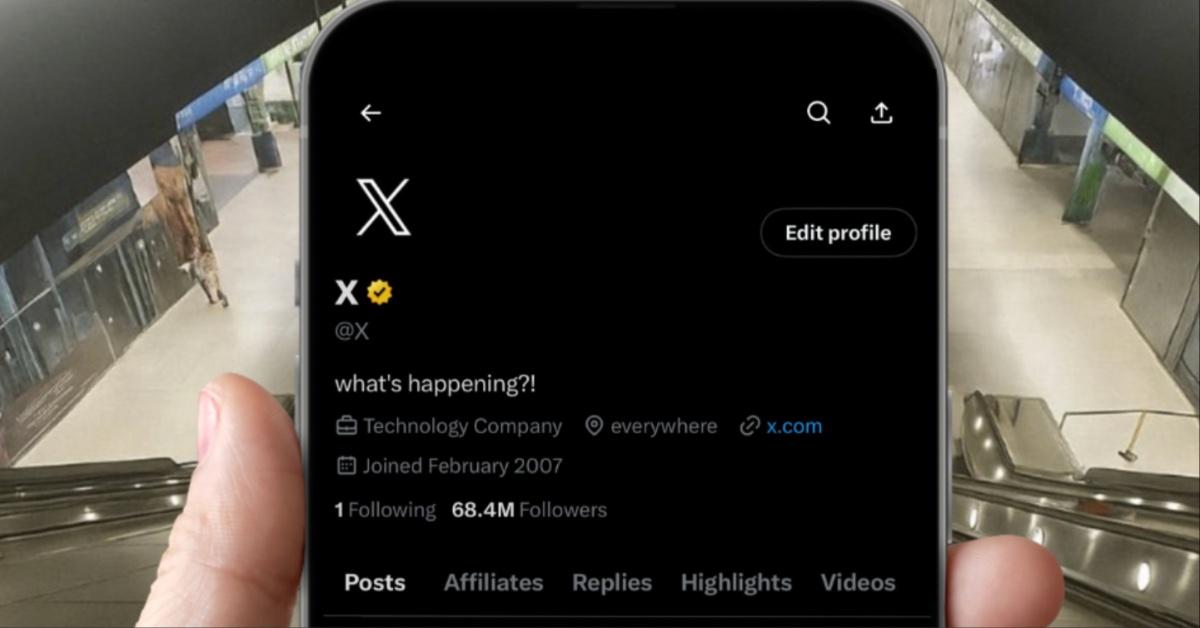 A person uses X on their cell phone. 