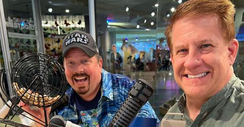 (l-r): former 107.5 The River hosts Woody and Jim smiling next to microphones.
