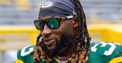 Aaron Jones wearing sunglasses and a Green Bay Packers uniform
