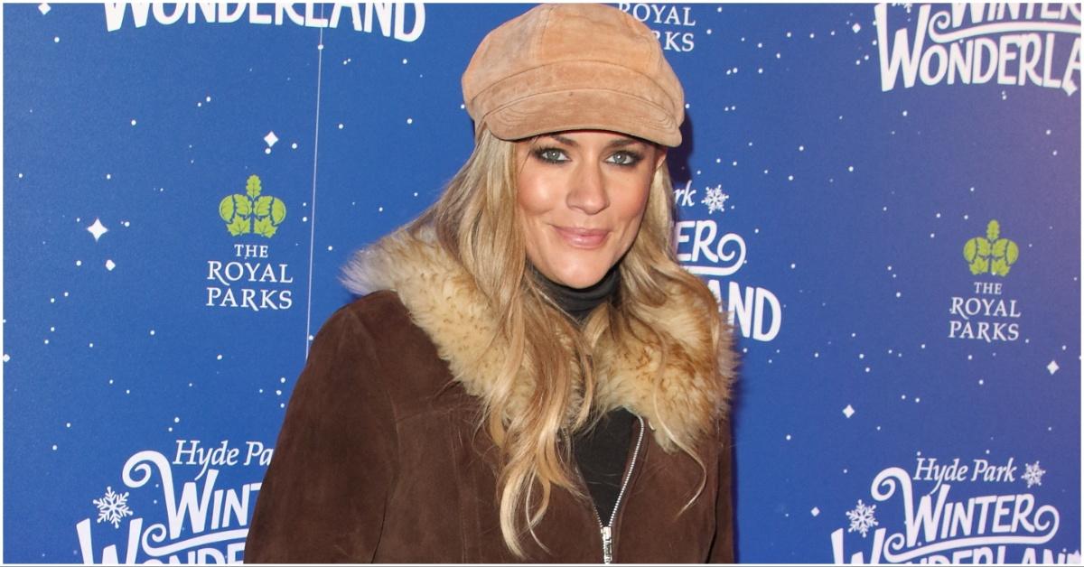 Caroline Flack posing for a press photo in 2019