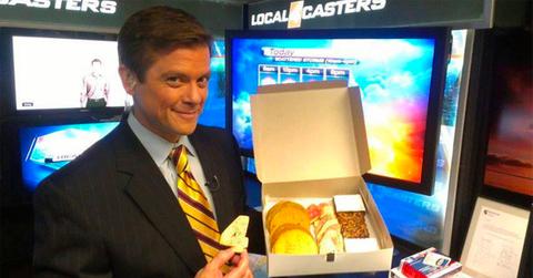 Brandon Roux holding a box of pastries at WDIV.