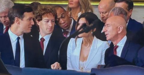 Mark Zuckerberg was caught sneaking a peek at Lauren Sanchez's chest.