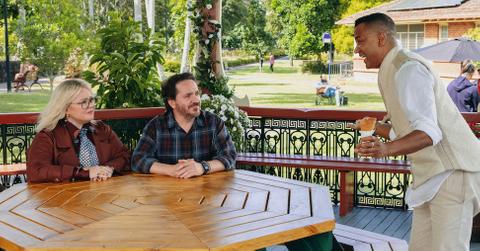 Melissa McCarthy as Amily Luck, Ben Falcone as Clark Thompson, Yanic Truesdale as Chamuel in episode 101 of God’s Favorite Idiot.