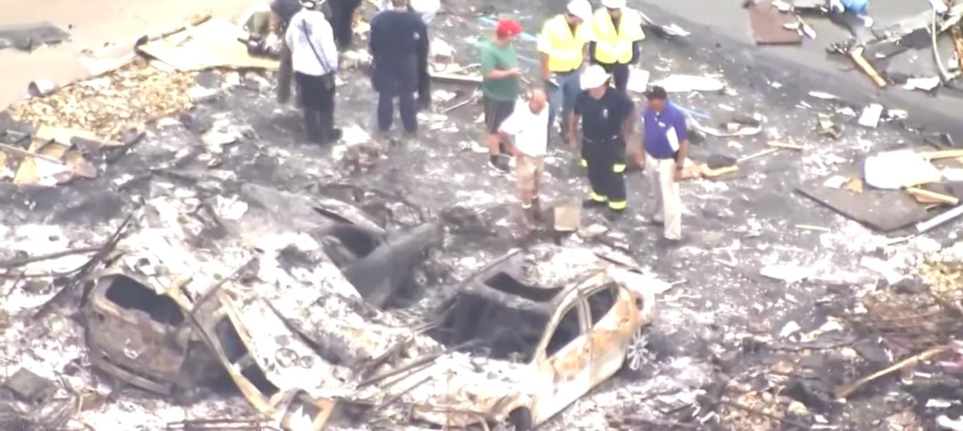 An image of firefighters on site at the Plum explosion site