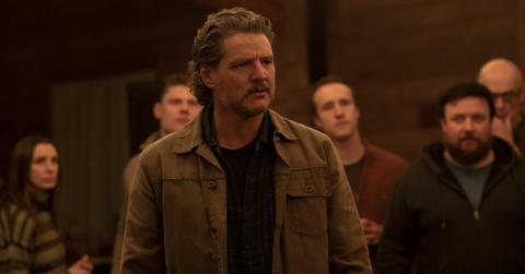 Joel surrounding by others in 'The Last of Us' Season 2.