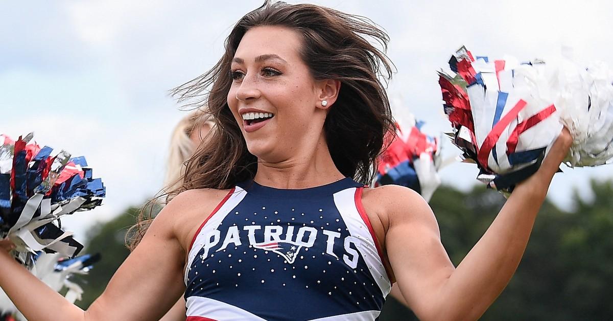 Cheerleader runs through a drill during training camp