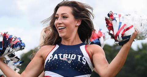 Cheerleader runs through a drill during training camp