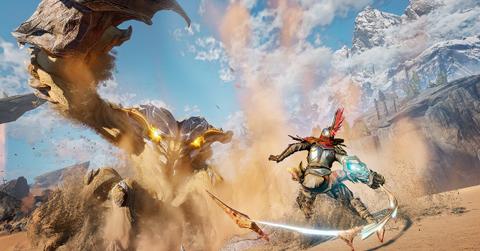 'Atlas Fallen' Player using a whip-like sword to attack a sand crab.