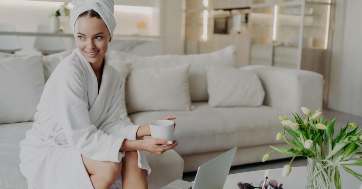 woman in white robe in living room