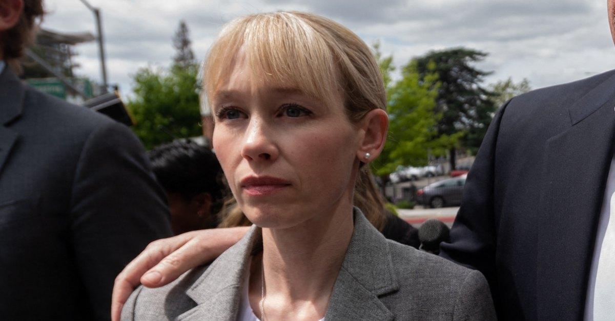 Sherri Papini walking with her legal team.