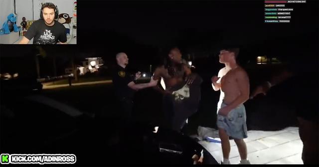 Jack Doherty and Izi Prime outside of Jack Doherty's house with police.