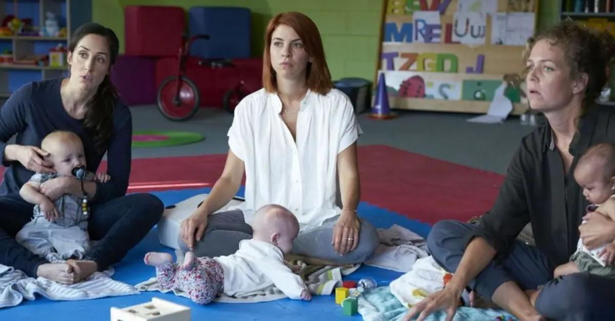 workin moms screencap of actresses sitting on floor