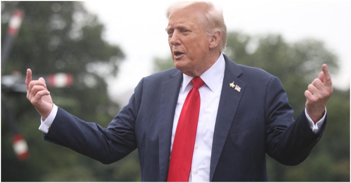 President Donald Trump wearing red white and blue