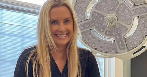 Dr. Roxy smiling in blue scrubs