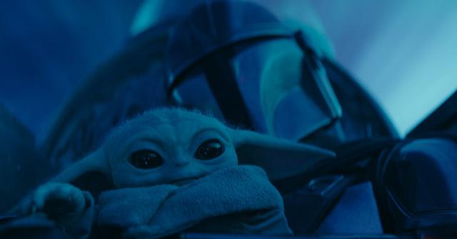 Grogu and Din Djarin (Pedro Pascal) in space