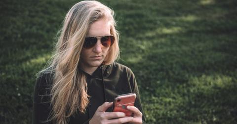 Woman using an iPhone