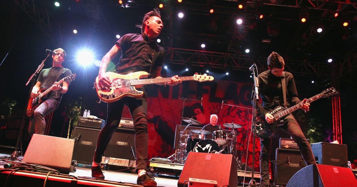 Musicians Chris Head, Chris Barker, Pat Thetic and Justin Sane of Anti-Flag perform onstage during day 1 of the 2014 Coachella Valley Music & Arts Festival at the Empire Polo Club on April 11, 2014 in Indio, California. (Photo by Imeh Akpanudosen/Getty Images for Coachella)