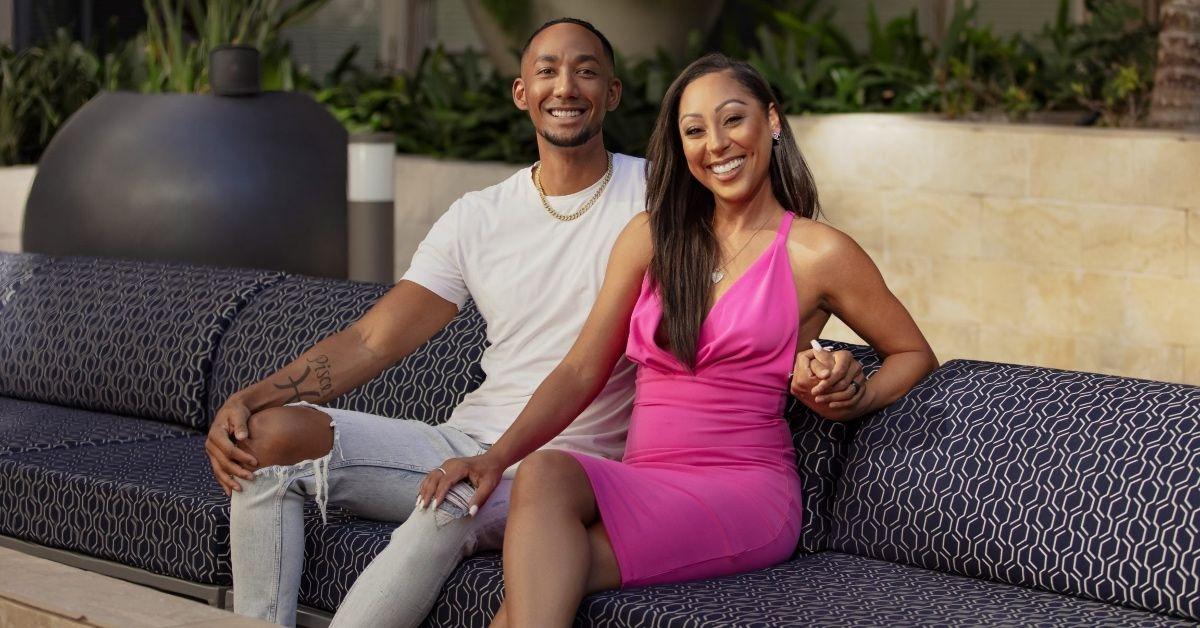 Nate and Stacia from 'Married at First Sight' sit on a couch outside