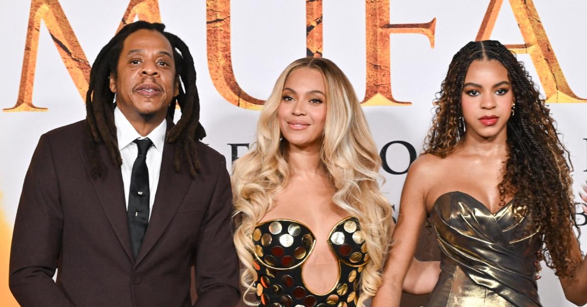 (l-r): Jay-Z, Beyonce, and Blue Ivy on the red carpet.