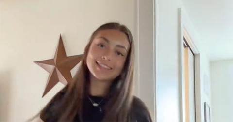 Faith Marie dancing in another one of her TikTok videos in a black T-shirt.