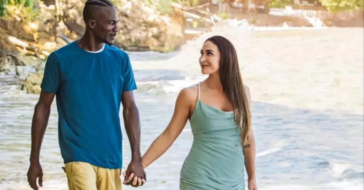 Everton and Jordan from '90 Day Fiancé: Love In Paradise' walk on a beach.