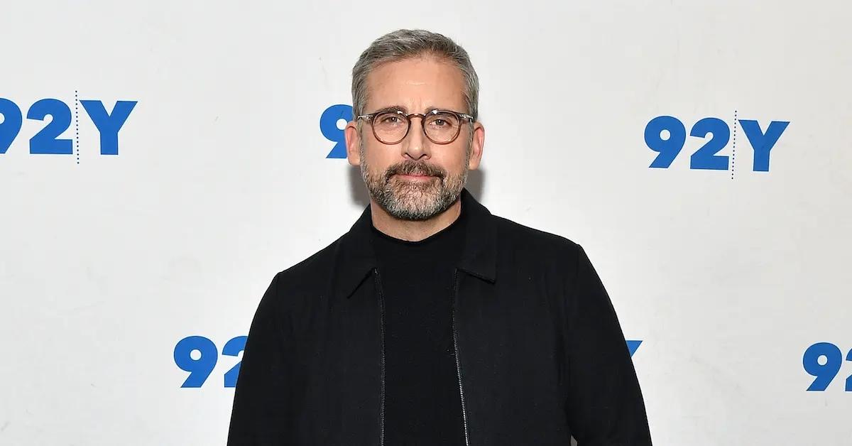 Actor Steve Carell attends an event in a black shirt and black jacket.