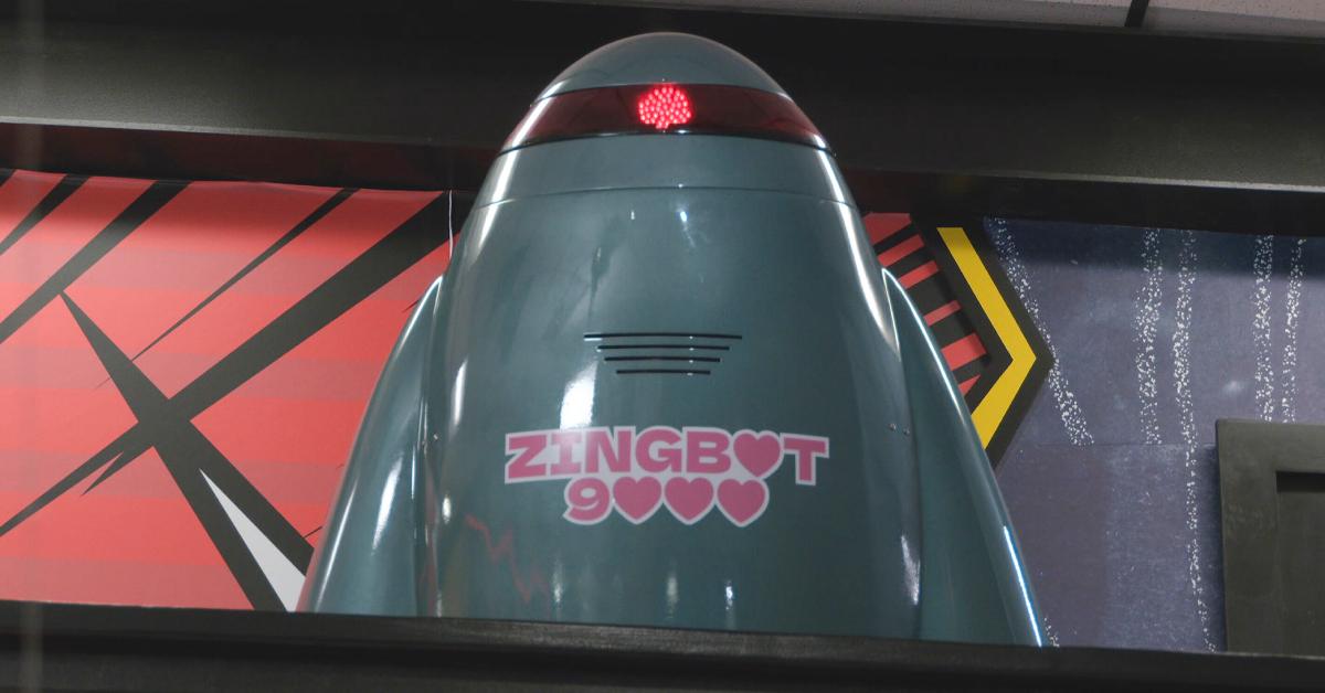 Zingbot looks down at the 'Big Brother' houseguests from the second floor balcony.