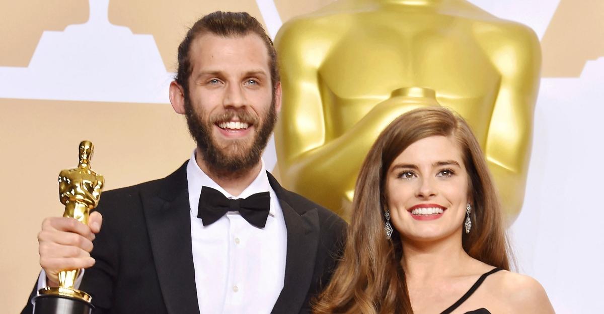 Rachel and her husband accept awards for their short film The Silent Child.