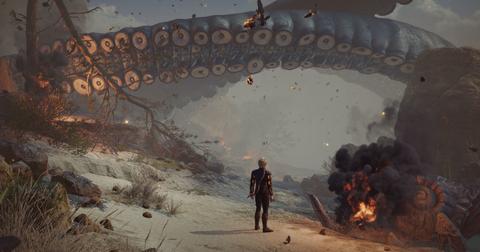 'Baldur's Gate 3' Alistair standing on a burning beach.