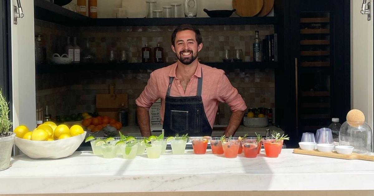 Cloyce Martin behind a bar