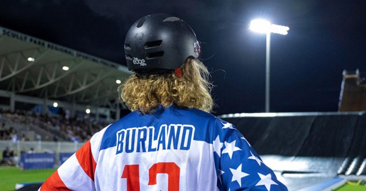 Luke Burland from behind in a Burland jersey. 