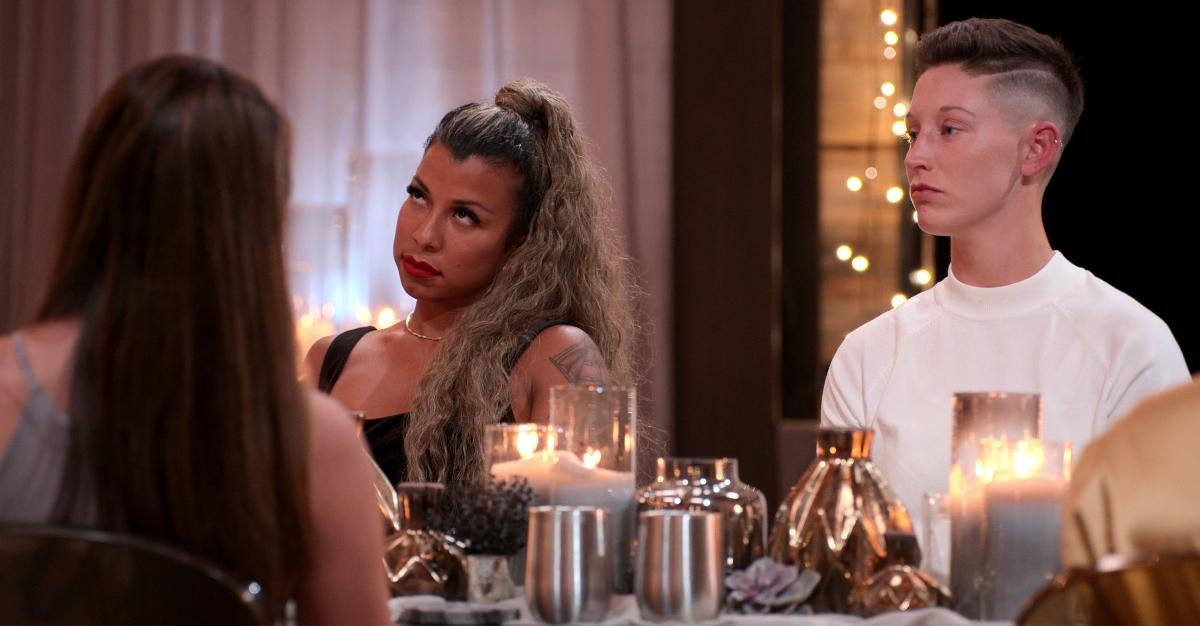 Yoly and Xander at a group dinner on 'The Ultimatum: Queer Love'