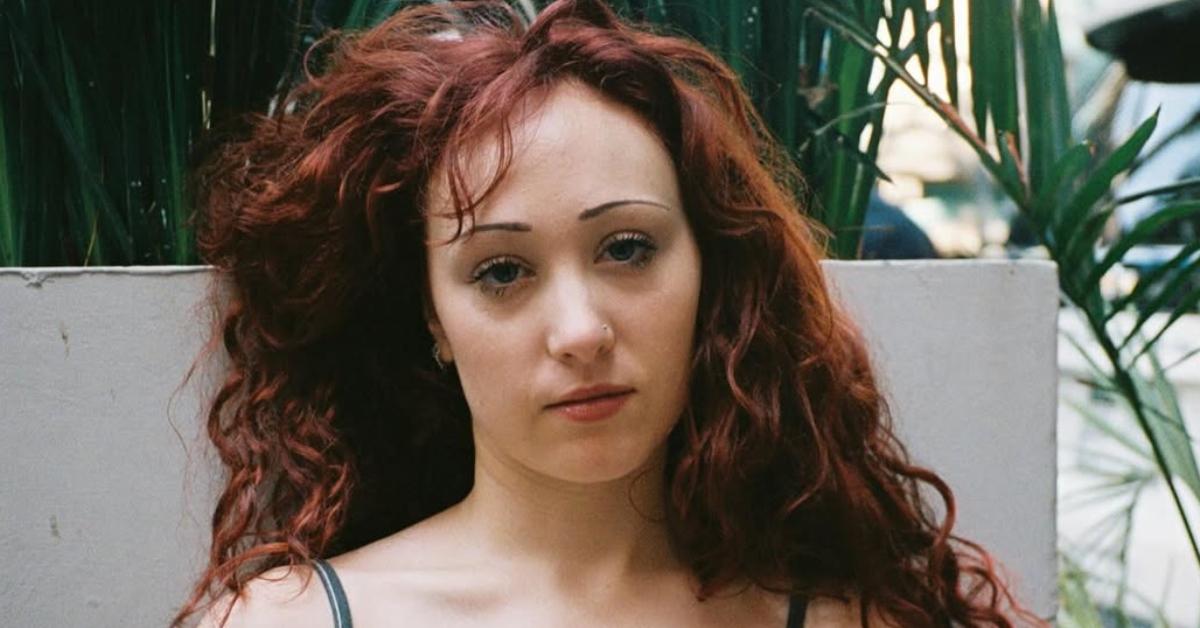 Chappell Roan at an outdoor restaurant.