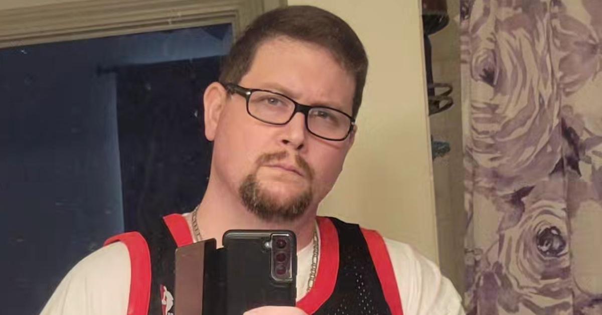 Gypsy Rose Blanchard's now estranged husband Ryan Scott Anderson takes a mirror selfie while wearing a jersey in June 2024