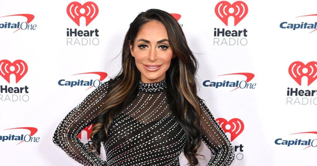 Angelina Pivarnick posing for photo at IHeart Radio event