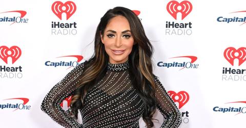 Angelina Pivarnick posing for photo at IHeart Radio event