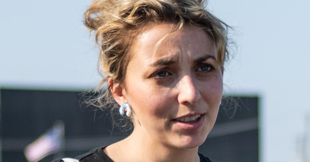 Kat Abughazaleh talking to someone at a protest