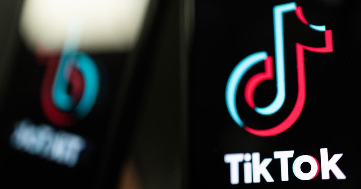 TikTok logo is displayed on an iPhone