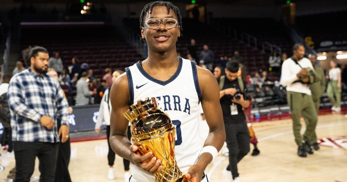 Bryce James poses with the championship trophy at The Chosen-1's Invitational at Galen Center.