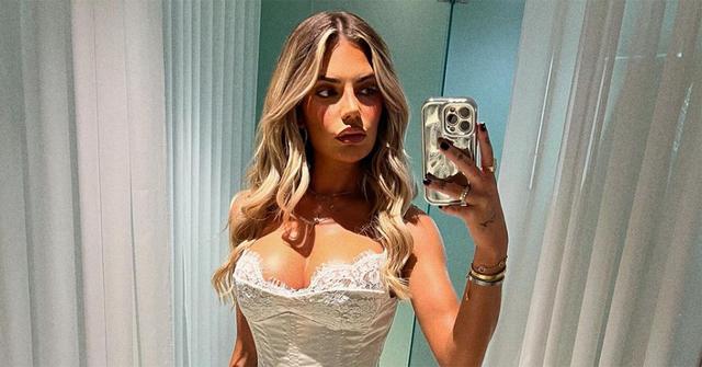 Megan Barton-Hanson poses for a selfie in the mirror.