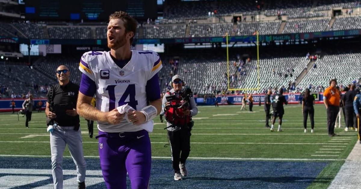 Sam Darnold on the field with the Vikings