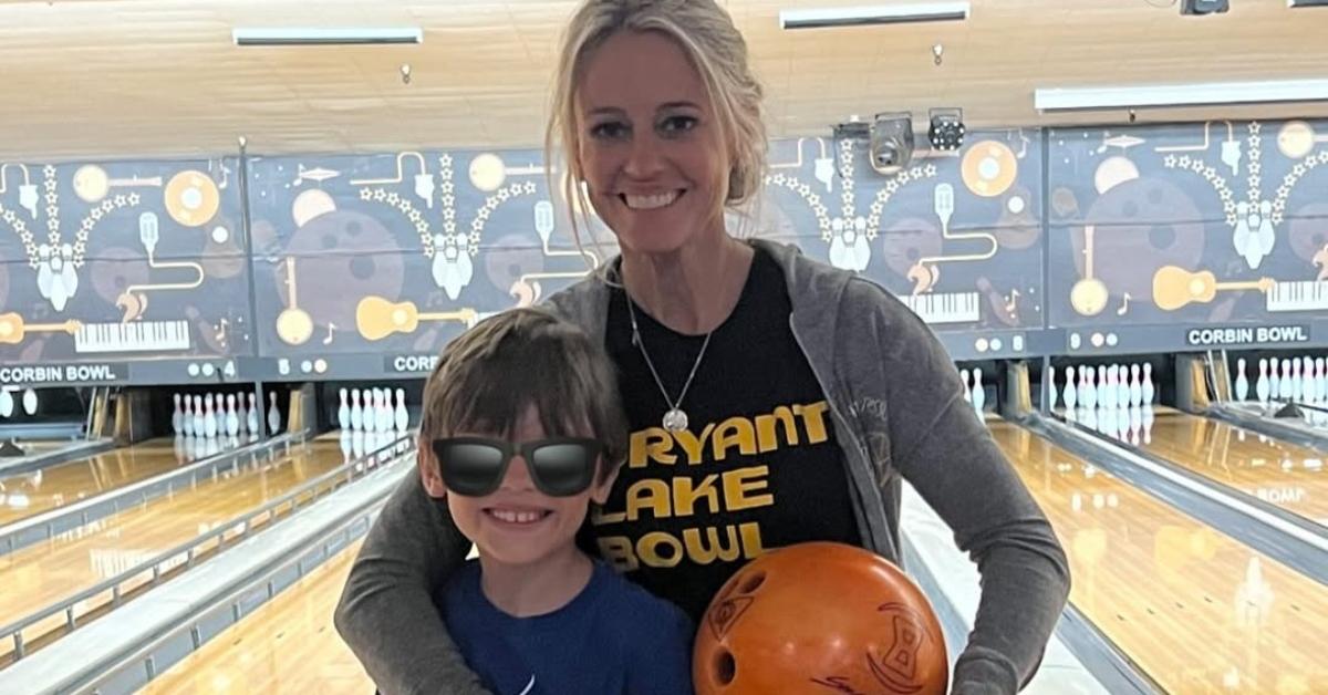 Nicole Curtis with one of her sons at a bowling alley.