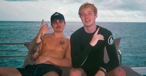 sam golbach and Colby brock on a boat