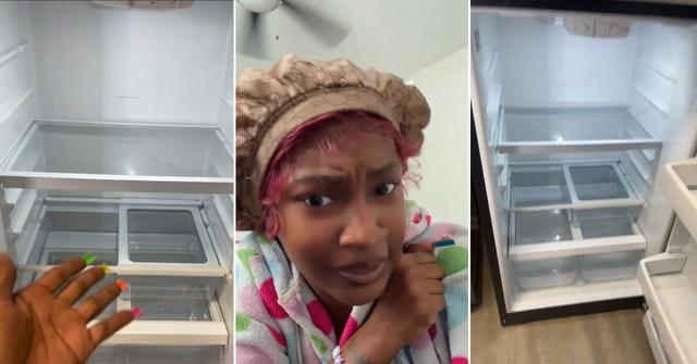 A woman who's disqualified from food stamps shows her empty refrigerator