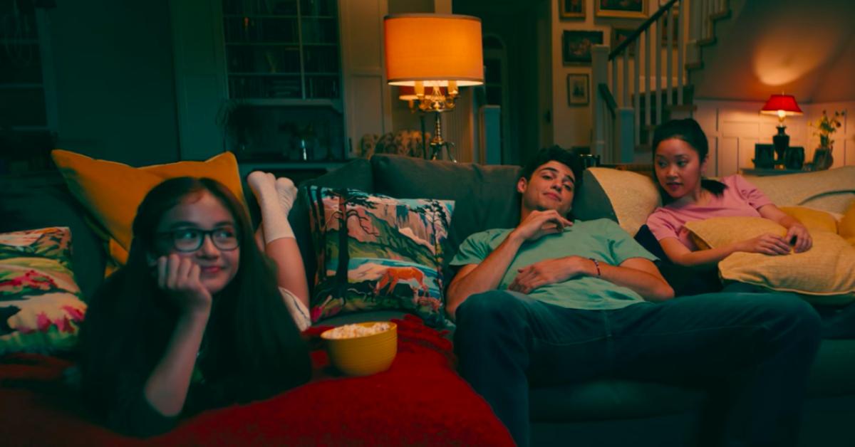 Kitty, Peter, and Lara Jean watching a movie in 'To All The Boys I've Loved Before'