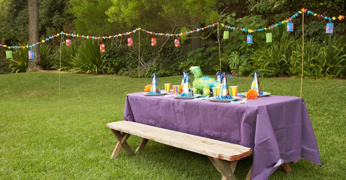 Children's party table set-up in backyard 