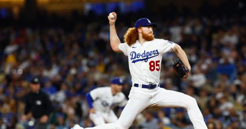 Dustin May of the Los Angeles Dodgers pitching a ball at Dodger Stadium.
