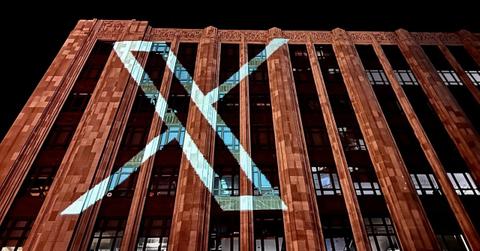 Twitter's new X logo on the side of its headquarters building