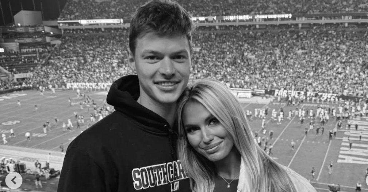 Emmy Sharrett and Will Kulp at a football game.