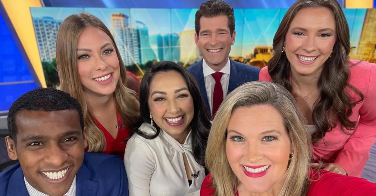 Jason Guy and several other WESH 2 anchors on set